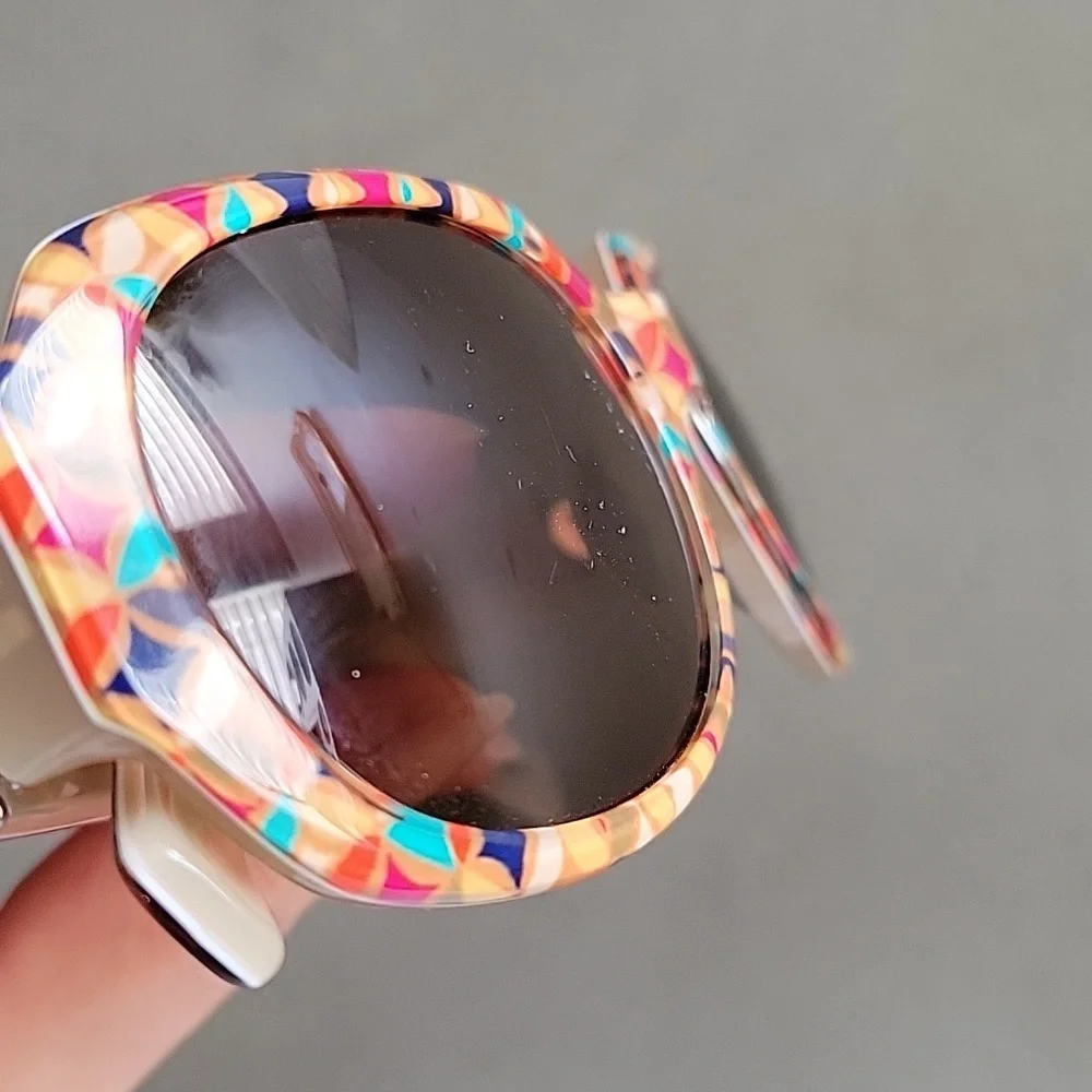 Fossil Sunglasses feature a distinctive multicolor geometric mosaic